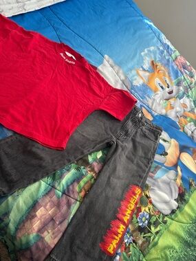 Palm Angels Red Tee with Black Jeans and Flame Logo